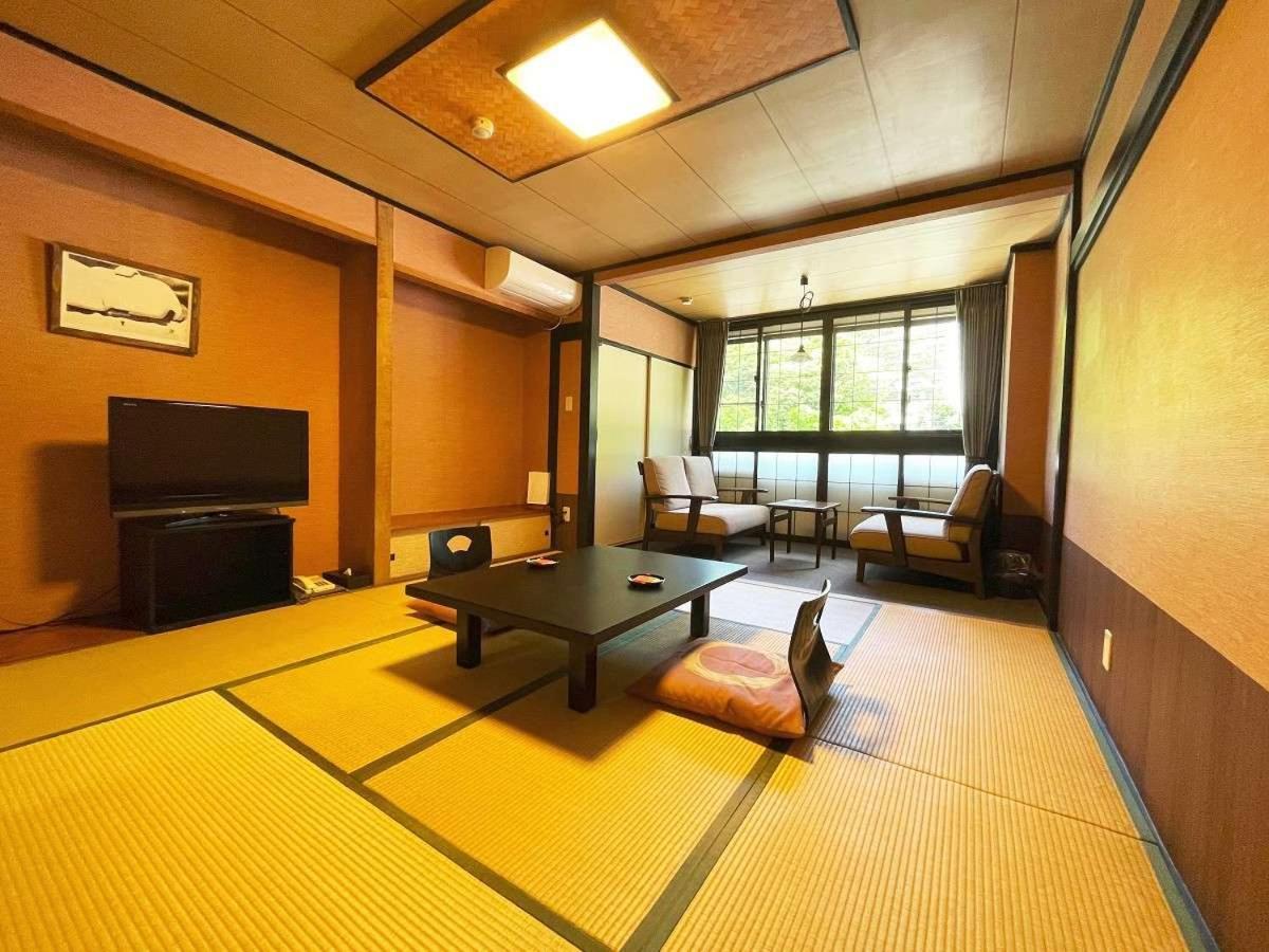 Отель Kutsurogijyuku Shintaki Аидзувакамацу Экстерьер фото